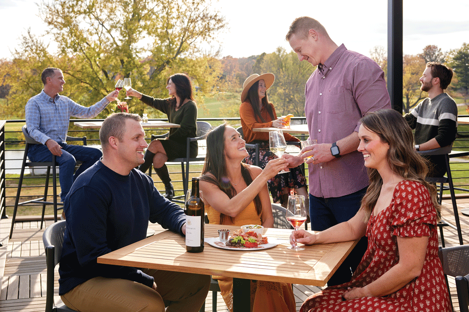 People enjoying wine at Rhonemus Cellars in Lancaster (photo by Kevin Kopanski)