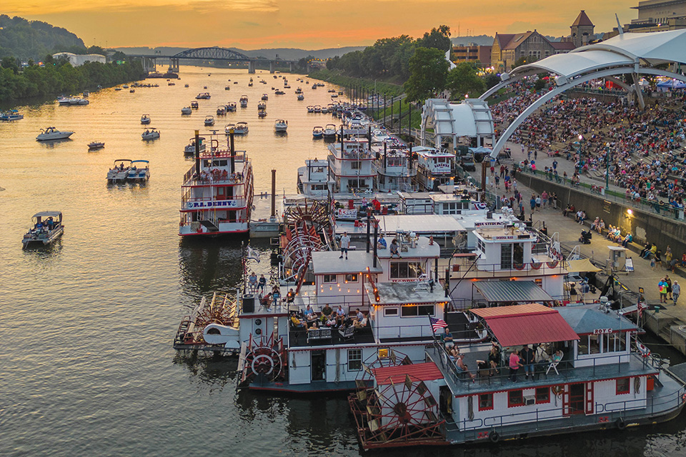 Charleston Sternwheel Regatta at sunset in Charleston, West Virginia (photo courtesy of West Virginia Department of Tourism)