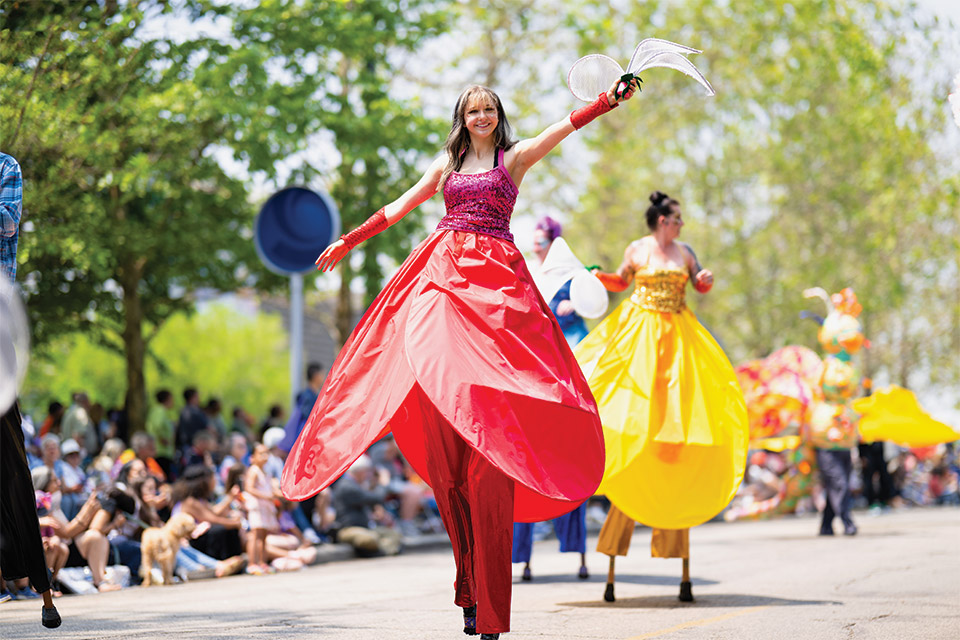 Woman on stilts at Parade the Circle in Cleveland (photo by Erik Drost)