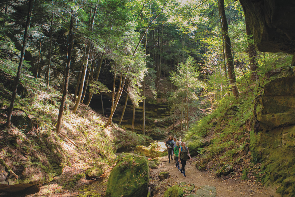 People hiking at Conkles Hollow State Nature Preserve in Rockbridge (photo by Laura Watilo Blake)