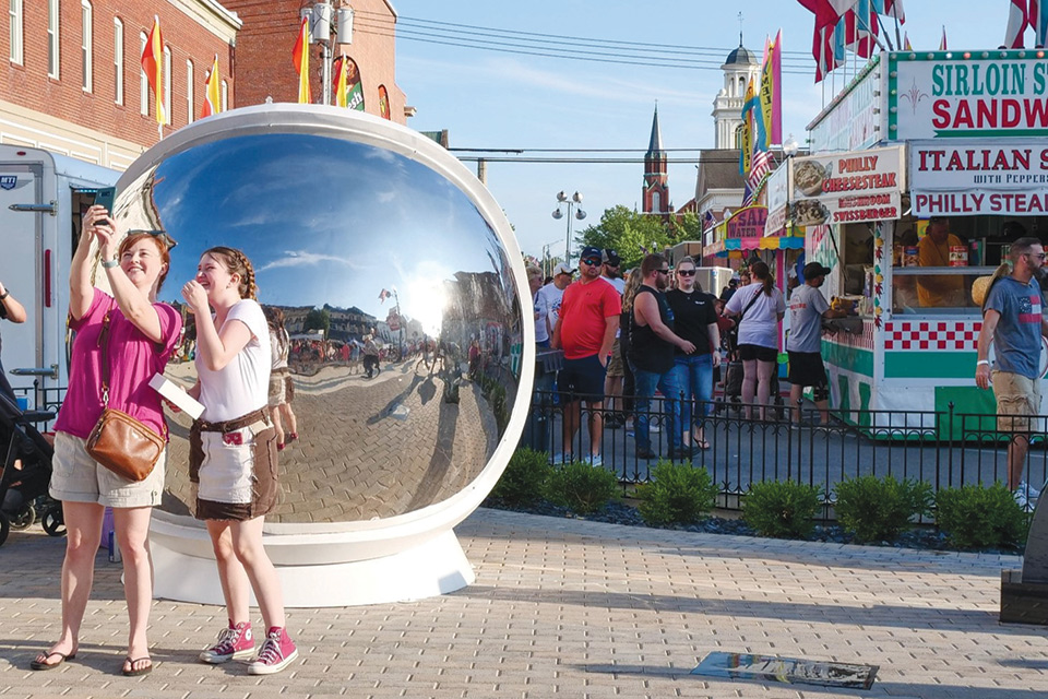 People taking photo at the Summer Moon Festival in Wapakoneta (photo courtesy of the Summer Moon Festival)