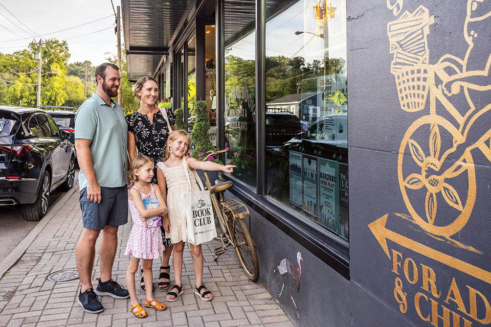 Family window-shopping at Loveland Trail Books (photo by Matthew Allen)